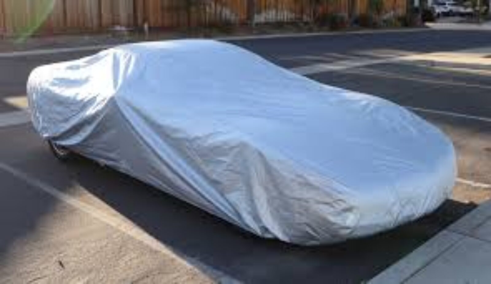 Car Covers: Is a Poly Tarp vs. Vinyl Tarp Better Protection